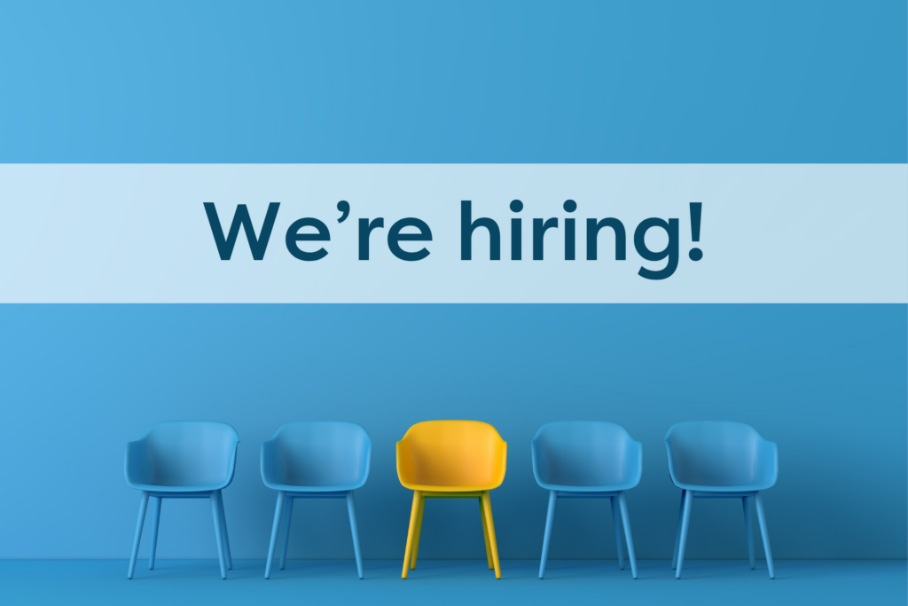 Image of blue chairs with a yellow one in the middle and the words "We're Hiring!"